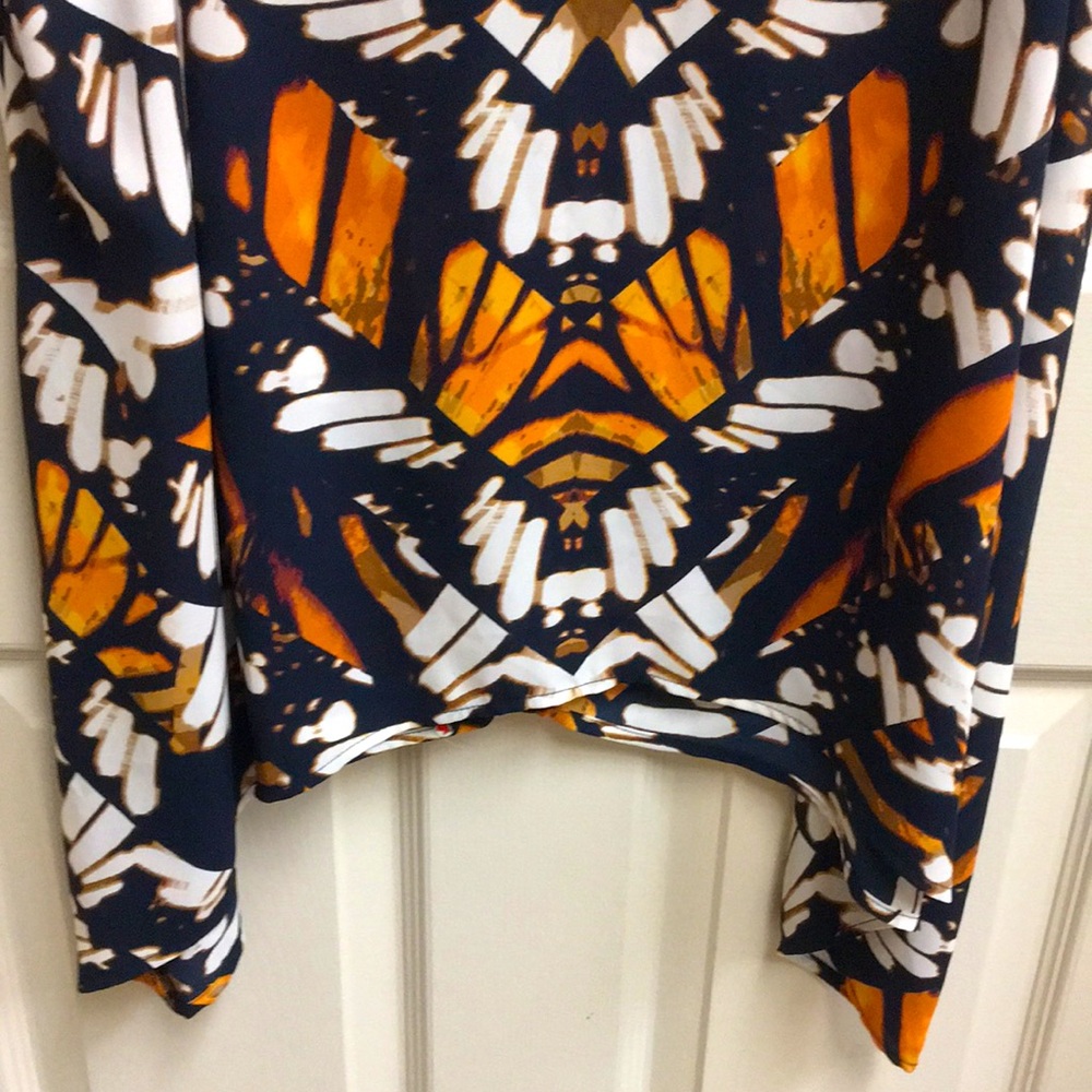 Abstract “Monarch Butterfly” Pattern Sleeveless Top with Shark Bite Hem - Picture 5 of 7
